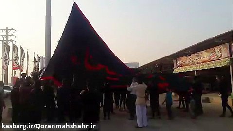 نصب پرچم امام حسین (ع) موقعیت قمر بنی هاشم شهرستان بندر ماهشهر در شلمچه
