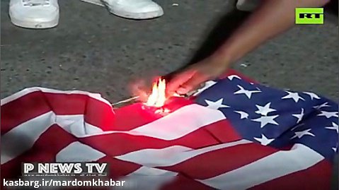 معترضان در پورتلند کتاب مقدس و پرچم آمریکا را آتش زدند